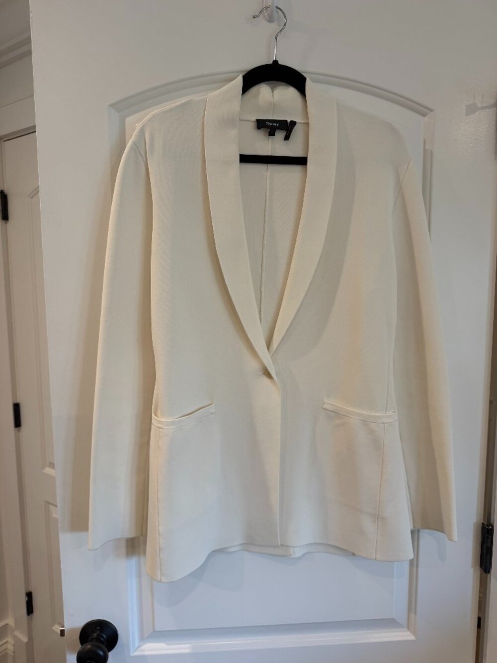 Ivory Theory blazer featuring a classic shawl collar and a single-button